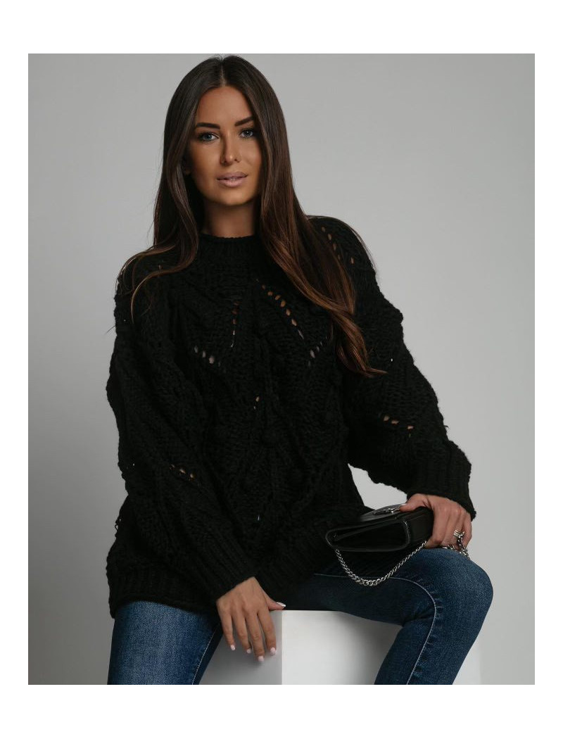 Sweter damski czarny przedłużany wzorzysty Sweter damski czarny przedłużany wzorzysty